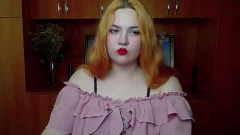 Snapshot of redhotqueen1 chatting on 05-18-26, 12:11 Rina online show from 05-18-26, 12:11